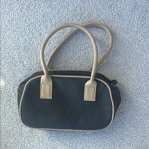 Elegant Black and Tan Women's Handbag